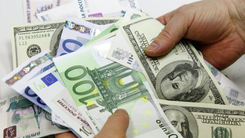 Курс доллара опустился ниже 66 руб.